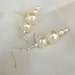 Creamy Ivory glass pearls, silver filigree bead caps Winter Wedding earrings