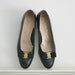 Black leather classic Ferragamo bow low heel pumps, size 10 1/2 B