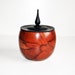 Pink Hawthorne box with blackened walnut finial lid