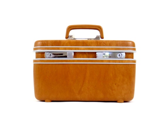 samsonite gold suitcase