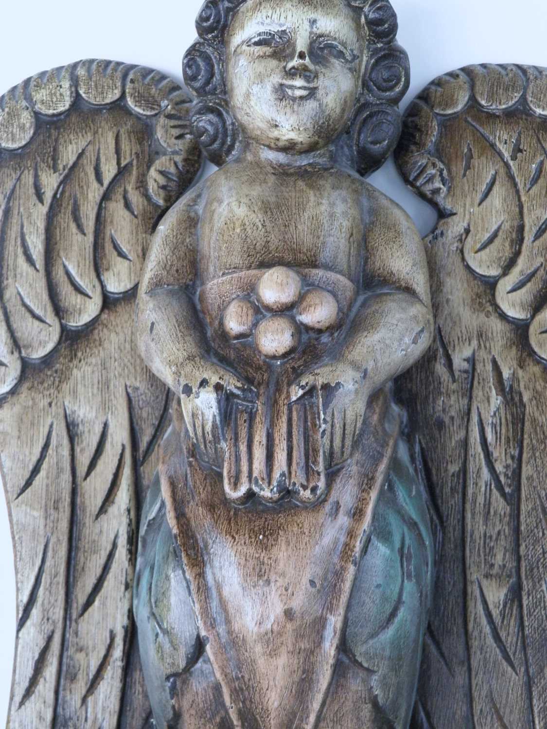 folk art angel figurine