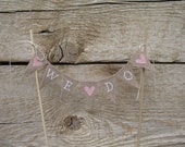 We Do Baker Banner Wedding cake topper in tea dyed cotton and pink hearts.