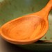 Small kitchen utensil spoon of Apple wood for serving relish and the like