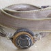 Silk Whirly Wrap Bracelet in slate sand and earth with a silver Celtic love knot neutral colors elegant