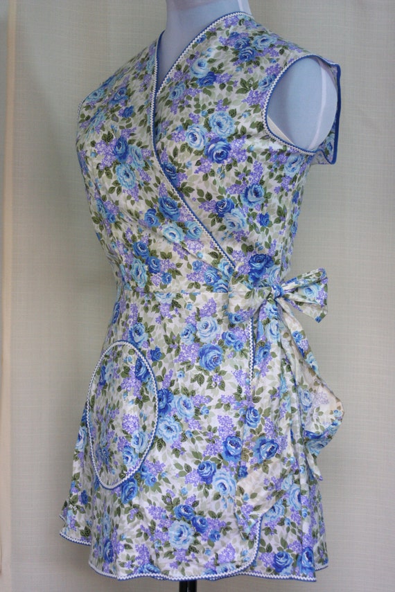 vintage apron wrap around style with blue and purple floral