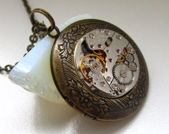 Steampunk Jewelry, Steampunk round locket necklace with vintage watch movement. Gift under 30 Dollars