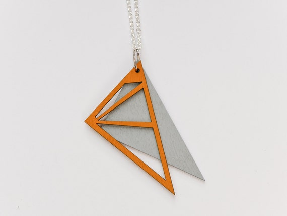 Items similar to triangle necklace on Etsy