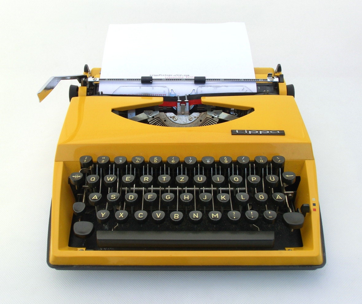 Vintage yellow typewriter manual Triumph Tippa from Europe
