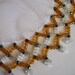 Beaded milk jug or sugar bowl cover