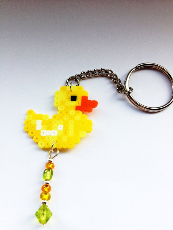 Items similar to Yellow duck keychain with beads on Etsy