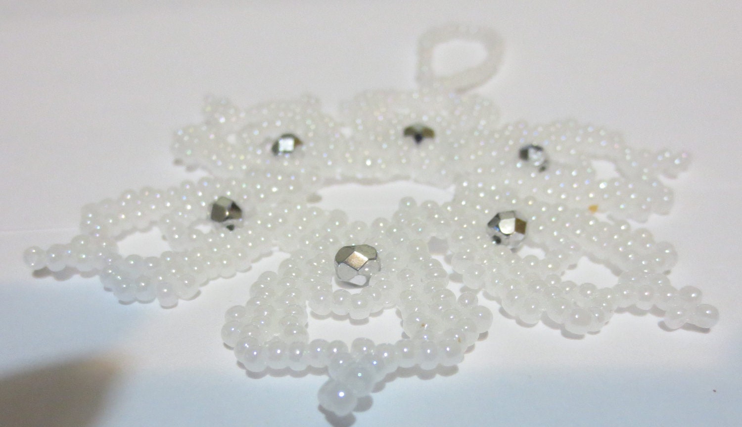 Bead and crystal snowflake / wreath ornament. - White and silver