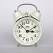 Vintage Czech small mechanical alarm clock from Prim. Dual bell. White.