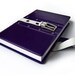 Purple leather journal in gift box