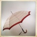 vintage umbrella curved amber colored hook handle with slip on case metal frame
