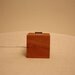 ipod/Iphone Dock made from Fijian Mahogany offcuts and finished in natural tung oil.