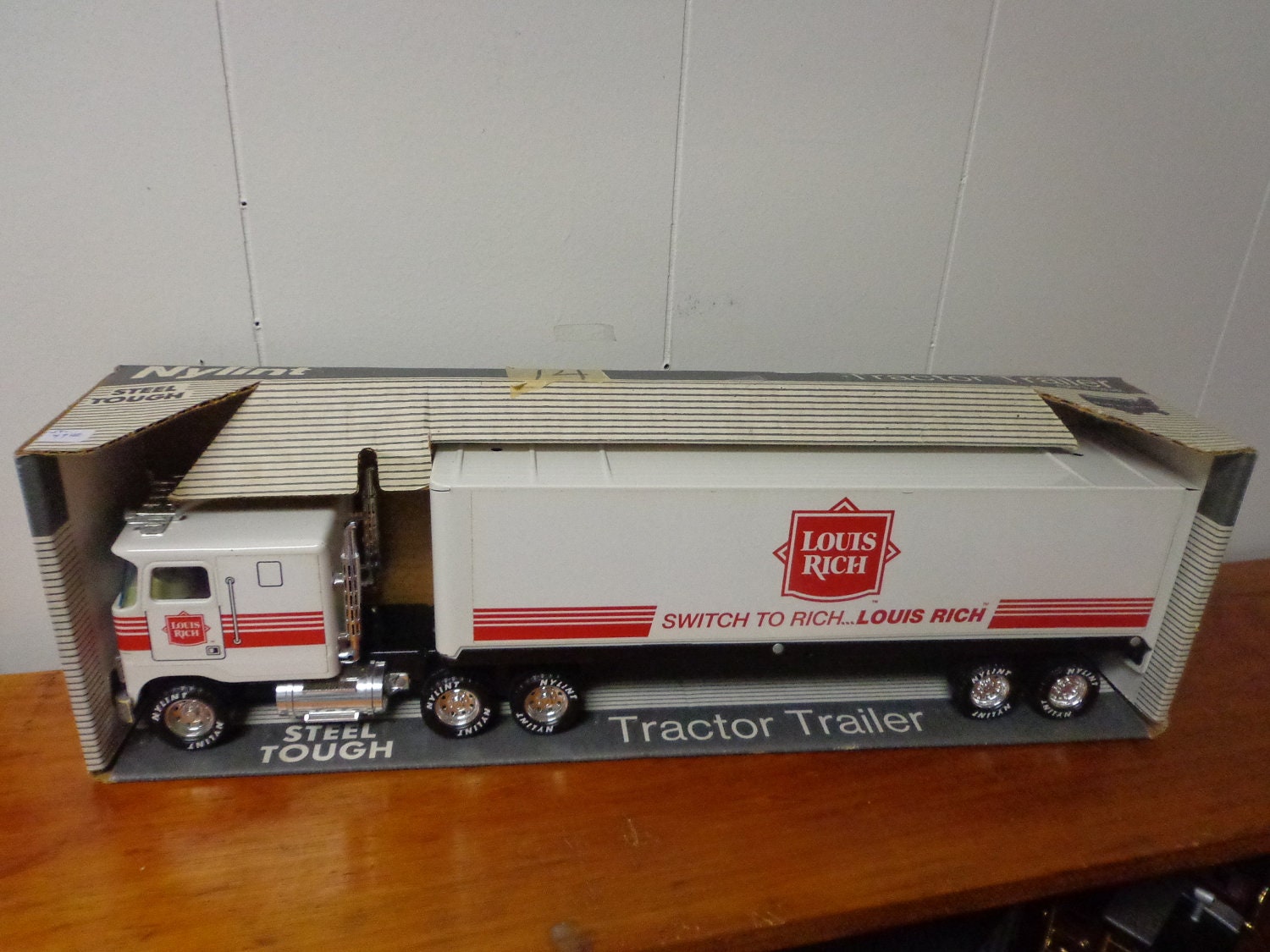 Large toy metal semi truck made for Louis Rich bakerygiven