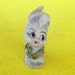 Vintage adorable big eyes bunny with a wreath around his neck