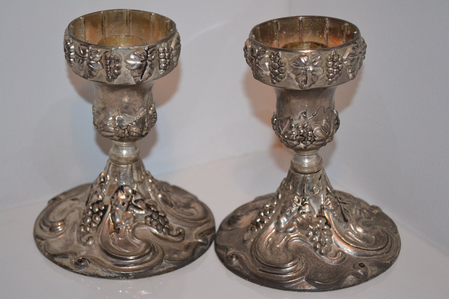 Pair of taper candle holders.GODINGER SILVER ART co. Grapes