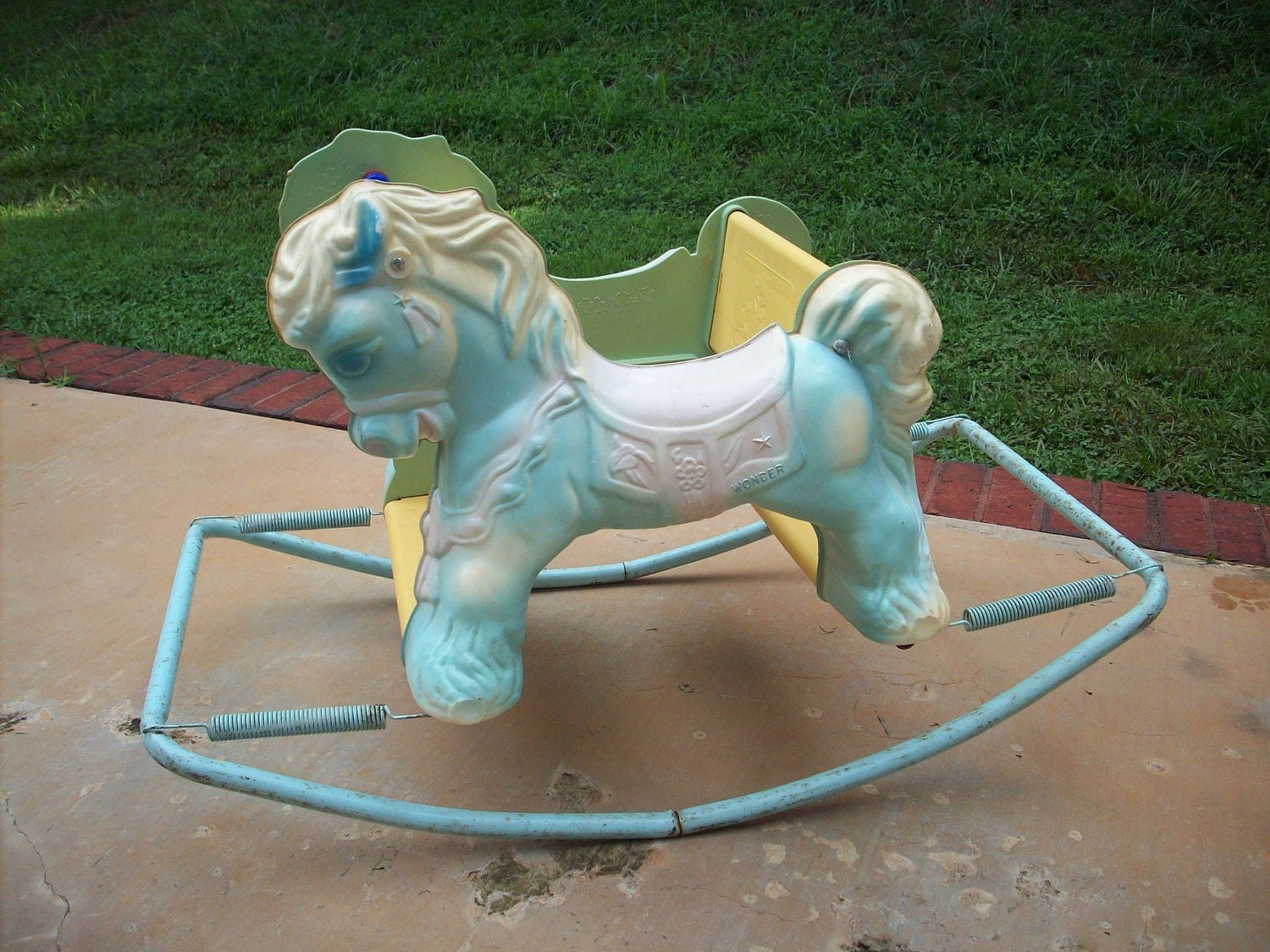 vintage plastic rocking horse with springs