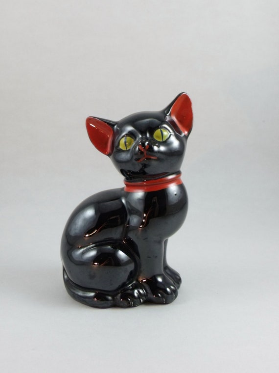 black and white ceramic cat figurine