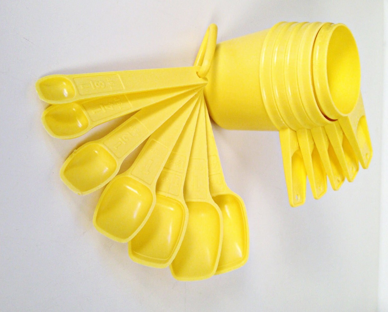 vintage Tupperware yellow measuring cups and spoons 12 piece