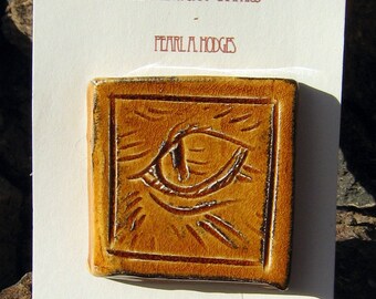 Small Handmade Ceramic Tile - Orange Cat Eye