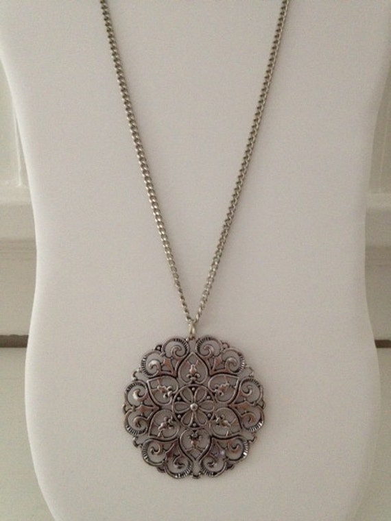 Items similar to Large Silver Medallion Pendant on Long Chain on Etsy
