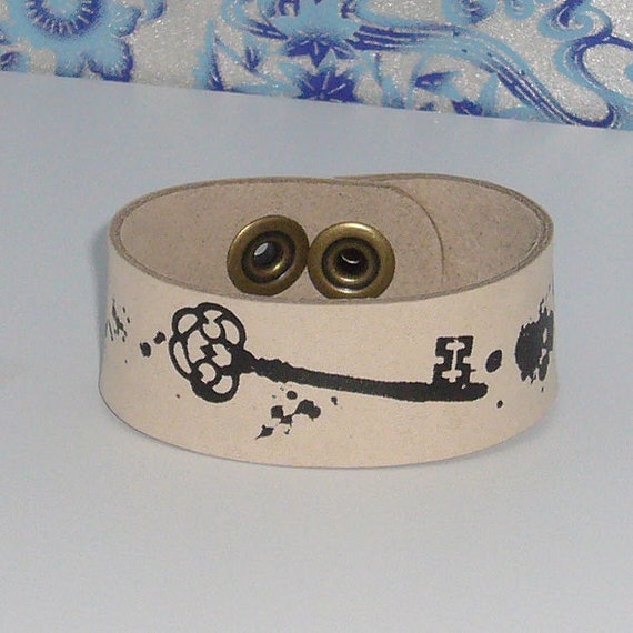 The "Ashes of Honor" leather wrist strap