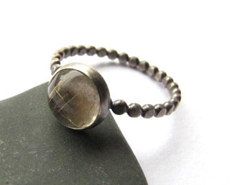 Resistance is Rutile quartz and sterling silver ring