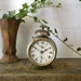 Vintage tin alarm clock
