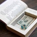 hollow book safe ''the shepherd of guadaloupe'' - small secret stash book with pretty purple cover