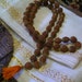 Shakti Priestess - Brass Capped Rudraksha Mala