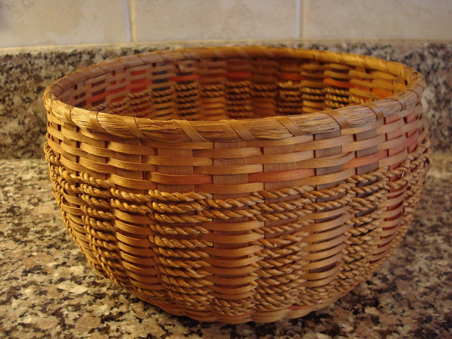 Vintage round native American basket made with sweet grass and