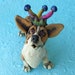 Corgi Dog in Jester Hat Ceramic Sculpture