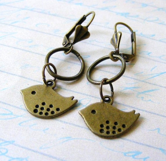 Antique Brass Bird Dangle Earrings on Shell by meiguidesigns