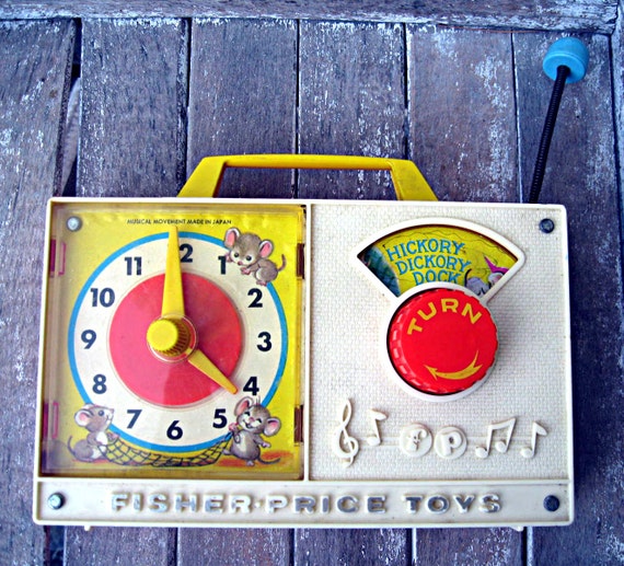 Vintage Fisher Price musical clock works darling graphics
