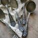 five vintage spoons