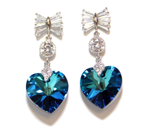 Items similar to Crystal Bow Earrings with Bermuda Blue Swarovski Heart ...