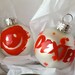 2 Dexter Glass Ornaments, Hand Painted