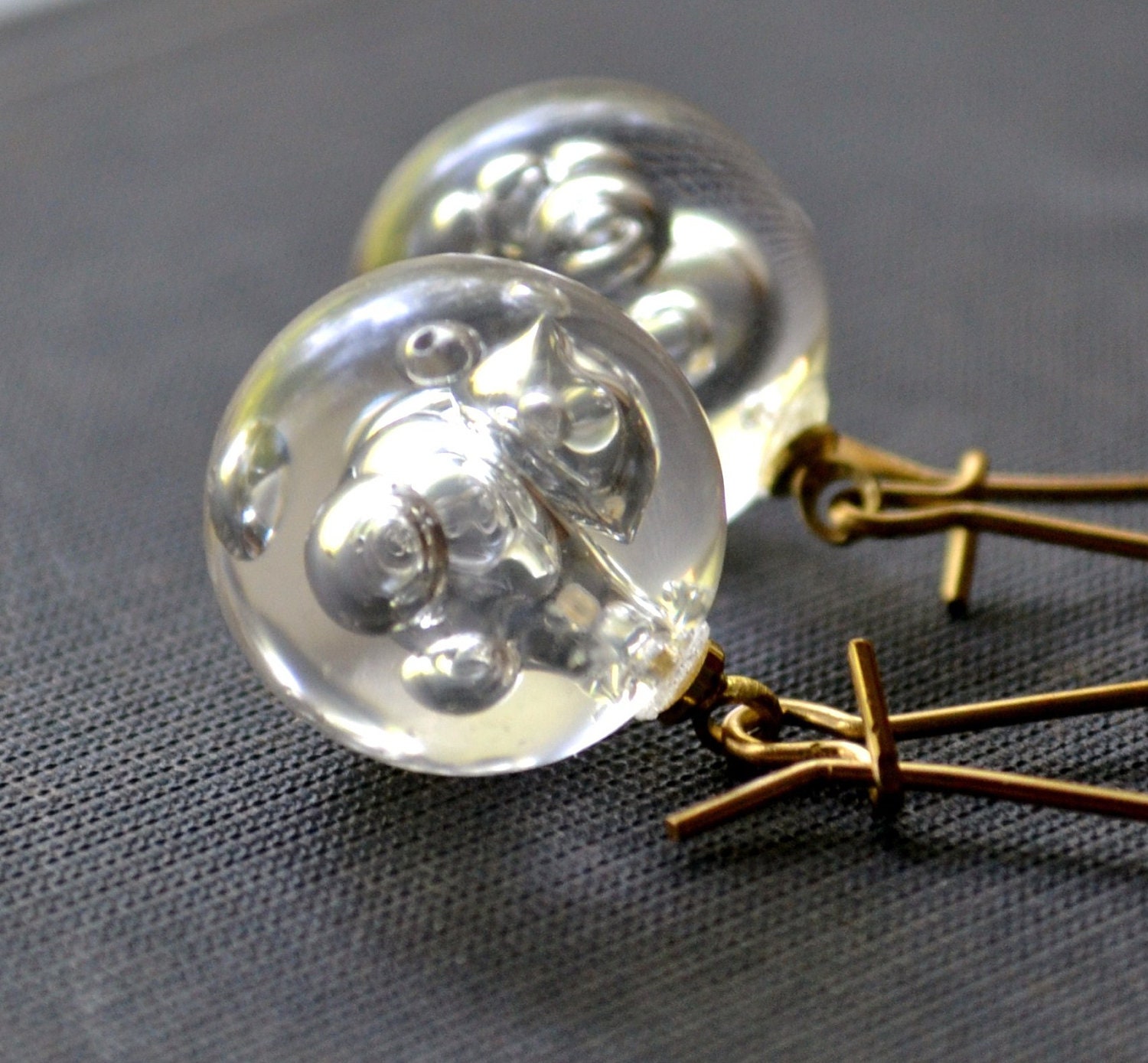 Orb.... vintage lucite ball charm earrings....