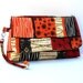 Clutch Bag with Strap, Wristlet - African Rhythms in Orange, Black and Cream