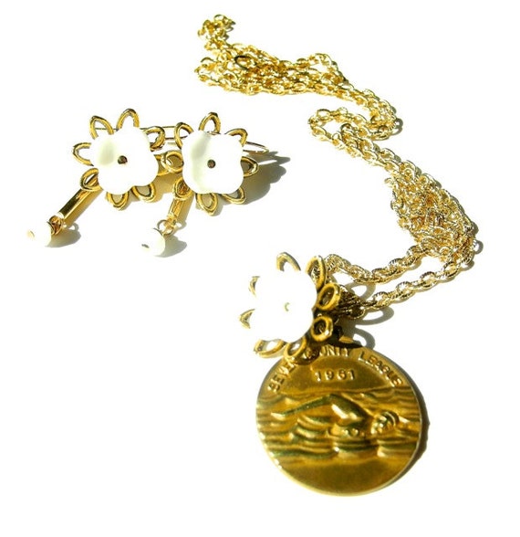 Items similar to Vintage Gold Swimming Medal Necklace by Dabchick Vintage Gems on Etsy