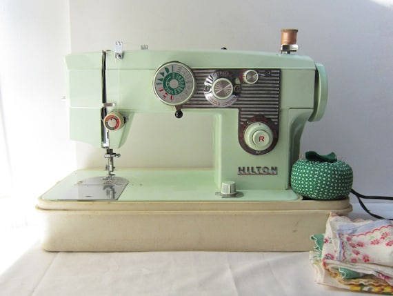 Vintage Green Hilton Sewing Machine Model 322 with Many