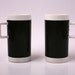 Pair of Braniff Airlines First Class Coffee Cups, Black Plastic, 1960s 1970s
