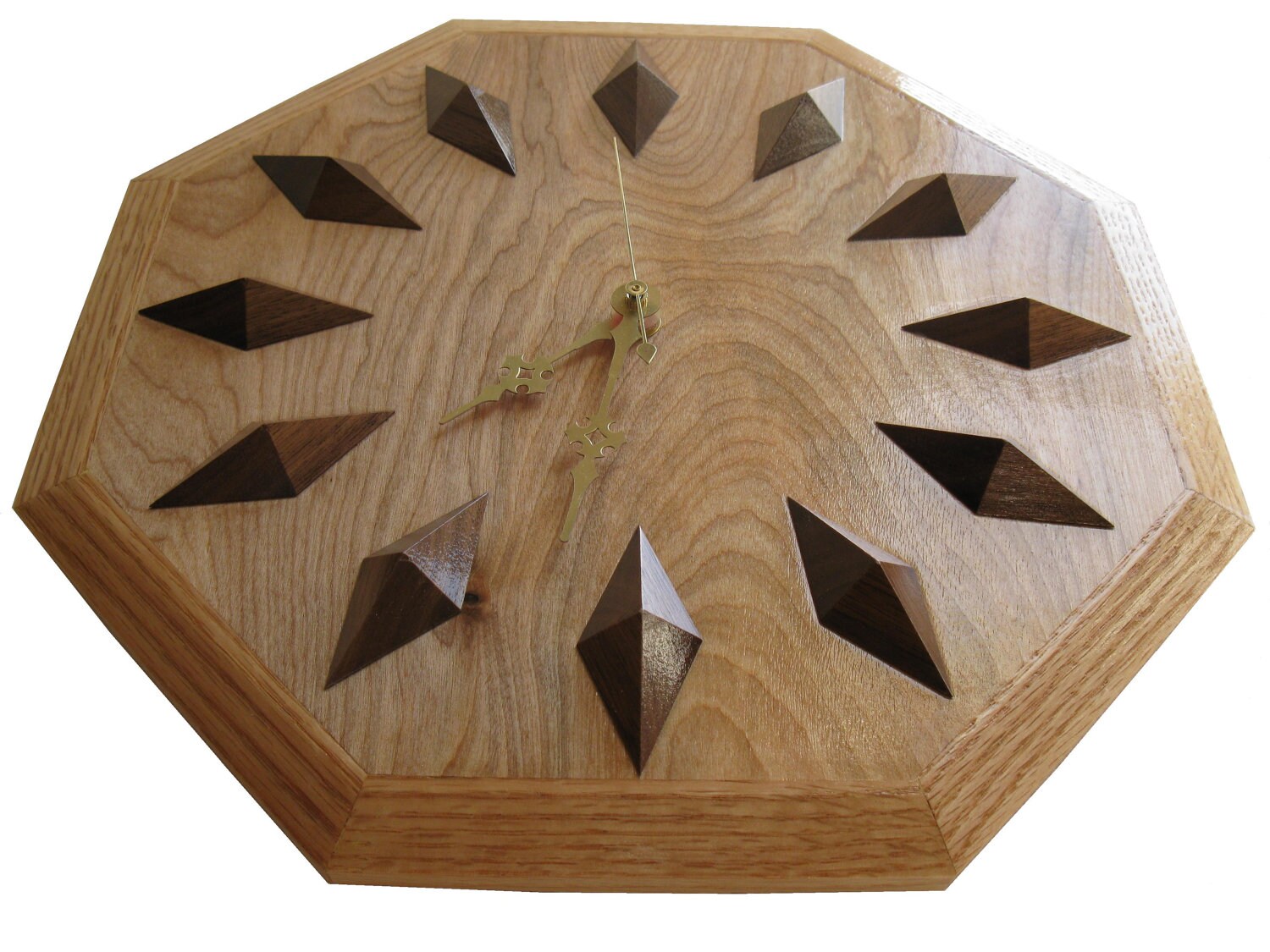 Wood Clock. Wooden hanging wall clock with oak trim and