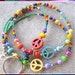 PEACEFUL TEACHER- Beaded ID Lanyard- Turquoise Peace Signs and Beads, Millefiore Beads, and a Rainbow of Glass Beads (Magnetic Clasp)