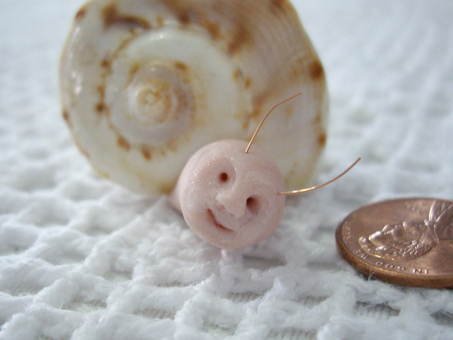 Miniature pink snails with faces in shells by jkinyon on Etsy