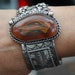 Massive sterling and ribbon agate storyteller bracelet by Navajo artist James Nez