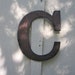 Metal letter "C"