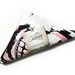 Reusable Shopping Bag handmade with white black and pink printed cotton edged in black ribbon tote bag folded into a triangle rock style